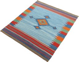 Corner detail of New Kilim Sofre rug showing border pattern and Wool pile