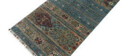 Backside of handmade New Samarkand rug showing knot structure and weave density