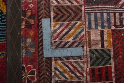 Close-up detail of 2000s Persian Gabbeh rug from Iran / Persia showing Wool weave