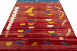 Surface texture of 2000s Persian Gabbeh rug with natural Wool and intricate pattern