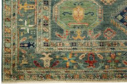 Corner detail of New Kazak rug showing border pattern and Wool pile