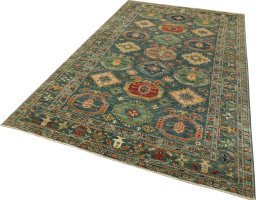 Corner detail of New Kazak rug showing border pattern and Wool pile