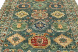 Backside of handmade New Kazak rug showing knot structure and weave density