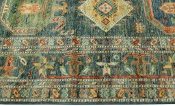 Full view of New Kazak rug from Pakistan, 311 × 205 cm in Green tones
