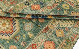Corner detail of New Kazak rug showing border pattern and Wool pile
