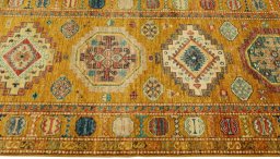 Close-up detail of New Kazak rug from Pakistan showing Wool weave