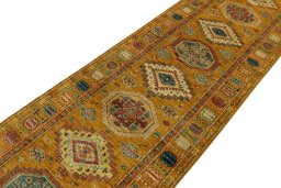 Backside of handmade New Kazak rug showing knot structure and weave density