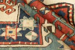 Close-up detail of 1900s Kazak rug from Armenia showing Wool weave