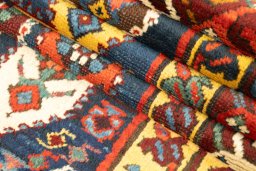 Close-up detail of 1900s Kazak rug from Armenia showing Wool weave