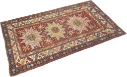 Corner detail of 1900s Kazak rug showing border pattern and Wool pile