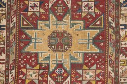 Central medallion detail of 1900s Kazak rug from Armenia