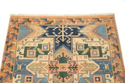 Surface texture of New Kazak rug with natural Wool and intricate pattern