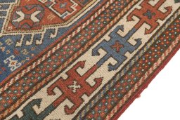 Central medallion detail of 1900s Kazak rug from Armenia