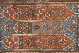 Close-up detail of 1900s Kazak rug from Armenia showing Wool weave