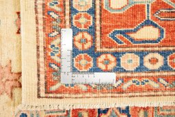 Full view of New Kazak rug from Pakistan, 240 × 168 cm in Cream tones