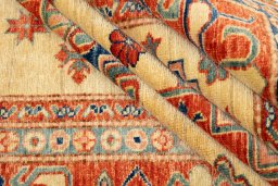 Corner detail of New Kazak rug showing border pattern and Wool pile