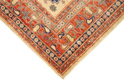 Backside of handmade New Kazak rug showing knot structure and weave density