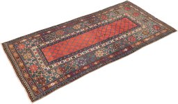 Corner detail of 1900s Kazak rug showing border pattern and Wool pile