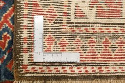 Corner detail of 1880s Kazak rug showing border pattern and Wool pile