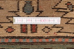 Corner detail of 1900s Kazak rug showing border pattern and Wool pile