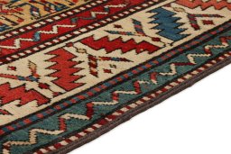Central medallion detail of 1900s Kazak rug from Armenia