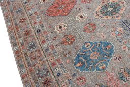 Backside of handmade New Kazak rug showing knot structure and weave density