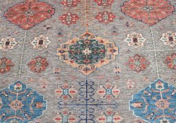 Close-up detail of New Kazak rug from Pakistan showing Wool weave