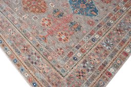 Full view of New Kazak rug from Pakistan, 422 × 310 cm in Multi Color tones