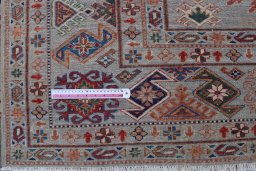 Central medallion detail of New Kazak rug from Pakistan