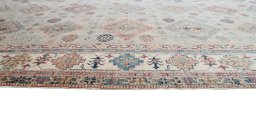 Close-up detail of New Kazak rug from Pakistan showing Wool weave