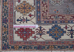Central medallion detail of New Kazak rug from Pakistan