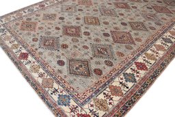 Full view of New Kazak rug from Pakistan, 376 × 280 cm in Multi Color tones