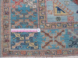 Central medallion detail of New Kazak rug from Pakistan