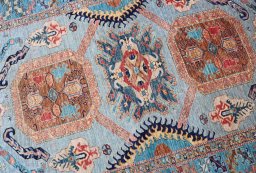 Central medallion detail of New Kazak rug from Pakistan