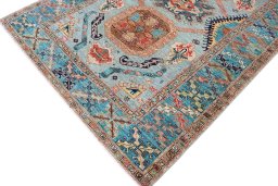 Full view of New Kazak rug from Pakistan, 243 × 168 cm in Multi Color tones