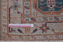 Central medallion detail of New Kazak rug from Pakistan