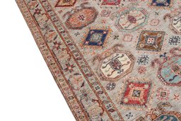 Backside of handmade New Kazak rug showing knot structure and weave density