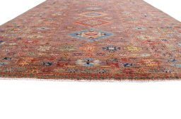 Corner detail of New Kazak rug showing border pattern and Wool pile