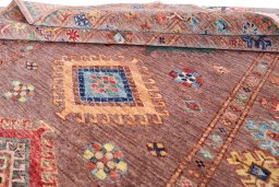 Surface texture of New Kazak rug with natural Wool and intricate pattern