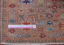 Central medallion detail of New Kazak rug from Pakistan