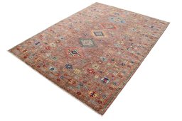 Corner detail of New Kazak rug showing border pattern and Wool pile