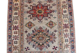 Close-up detail of New Kazak rug from Pakistan showing Wool weave