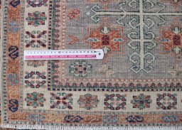 Central medallion detail of New Kazak rug from Pakistan