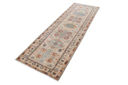 Corner detail of New Kazak rug showing border pattern and Wool pile
