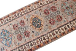 Central medallion detail of New Kazak rug from Pakistan