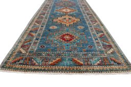Corner detail of New Kazak rug showing border pattern and Wool pile