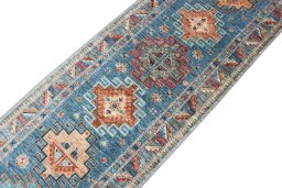 Central medallion detail of New Kazak rug from Pakistan