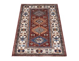 Corner detail of New Kazak rug showing border pattern and Wool pile
