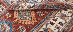 Central medallion detail of New Kazak rug from Pakistan