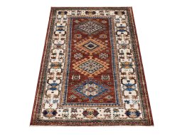 Corner detail of New Kazak rug showing border pattern and Wool pile